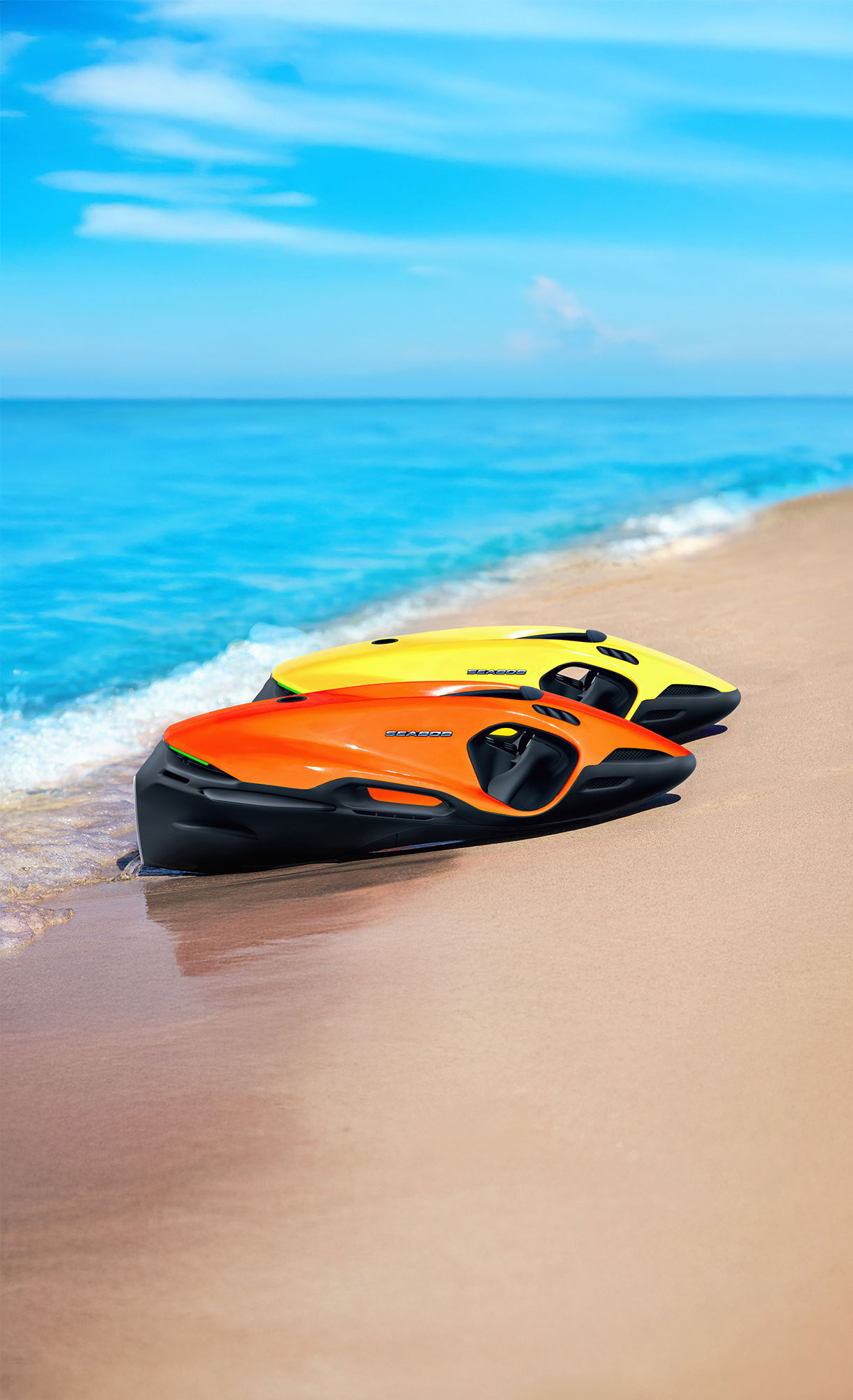Yellow and orange Seabob F9 jet scooters on a Turkish beach